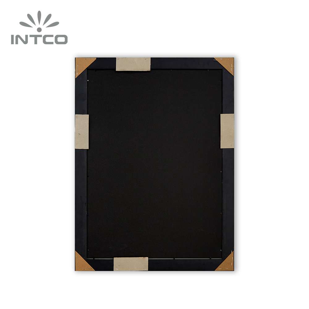 Intco wall framed mirror has a black MDF backing